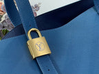 Louis Vuitton blue leather strap with gold padlock clasp and LV emblem