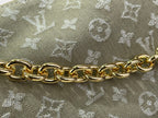 Gold-tone chain on Louis Vuitton monogram canvas handbag