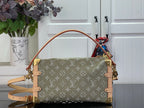 Louis Vuitton monogram handbag front view with gold-tone chain shoulder strap and tabs