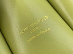 Louis Vuitton green lining with 'Louis Vuitton Paris made in France' text