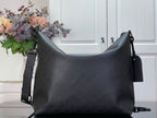 Louis Vuitton hobo bag with adjustable shoulder strap and top zip closure