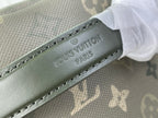 Louis Vuitton Paris embossed on gray-green leather strap with stitched edge