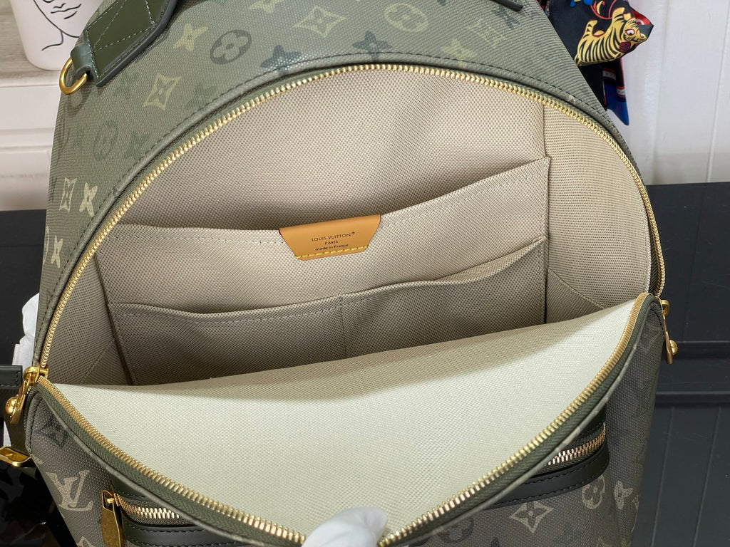 Louis Vuitton monogram bag interior with beige lining and gold zipper