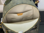Louis Vuitton monogram bag interior with beige lining and gold zipper