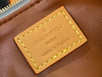 Louis Vuitton bag tan leather logo label with stitched edges and embossed “LOUIS VUITTON PARIS”