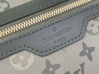 Louis Vuitton Paris logo stamp on gray fabric zipper tab with stitching