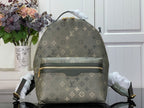 Louis Vuitton monogram backpack with top handle and front zip, gray-green canvas