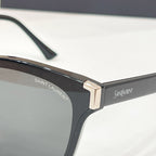 YSL black sunglasses temple close-up with gold metal logo detail