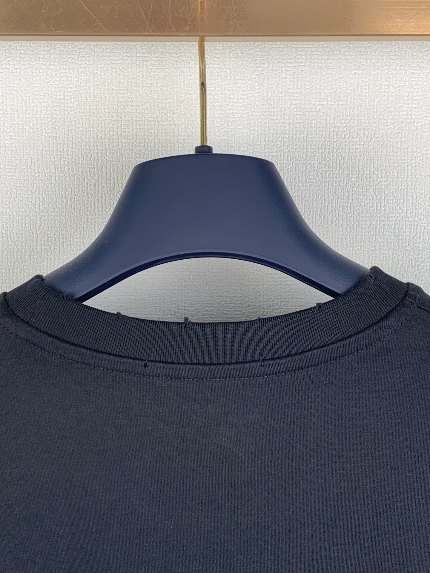Navy short-sleeve T-shirt collar view