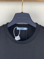 Navy T-shirt collar with Prada logo tag at the back neck