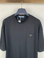 Dark short-sleeve T-shirt with Prada triangle logo at left chest