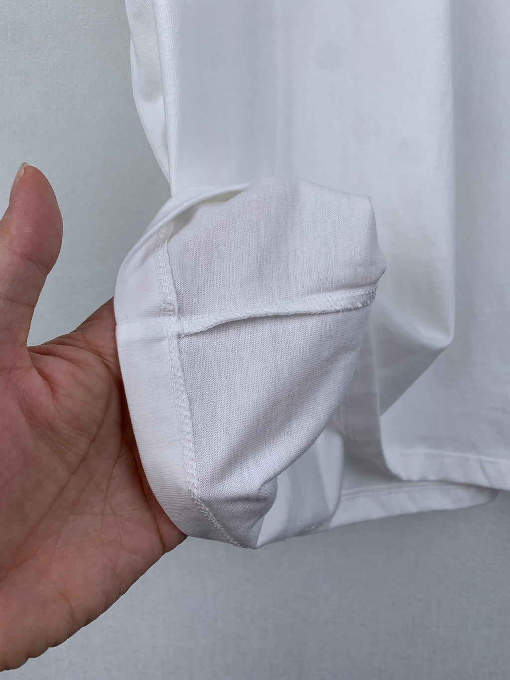 Dior short-sleeve T-shirt, stitched hem and sleeve cuff detail in white