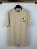 Beige T-shirt with embroidered cat motif on the chest