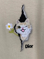 Cat and Dior logo embroidery on a beige T-shirt