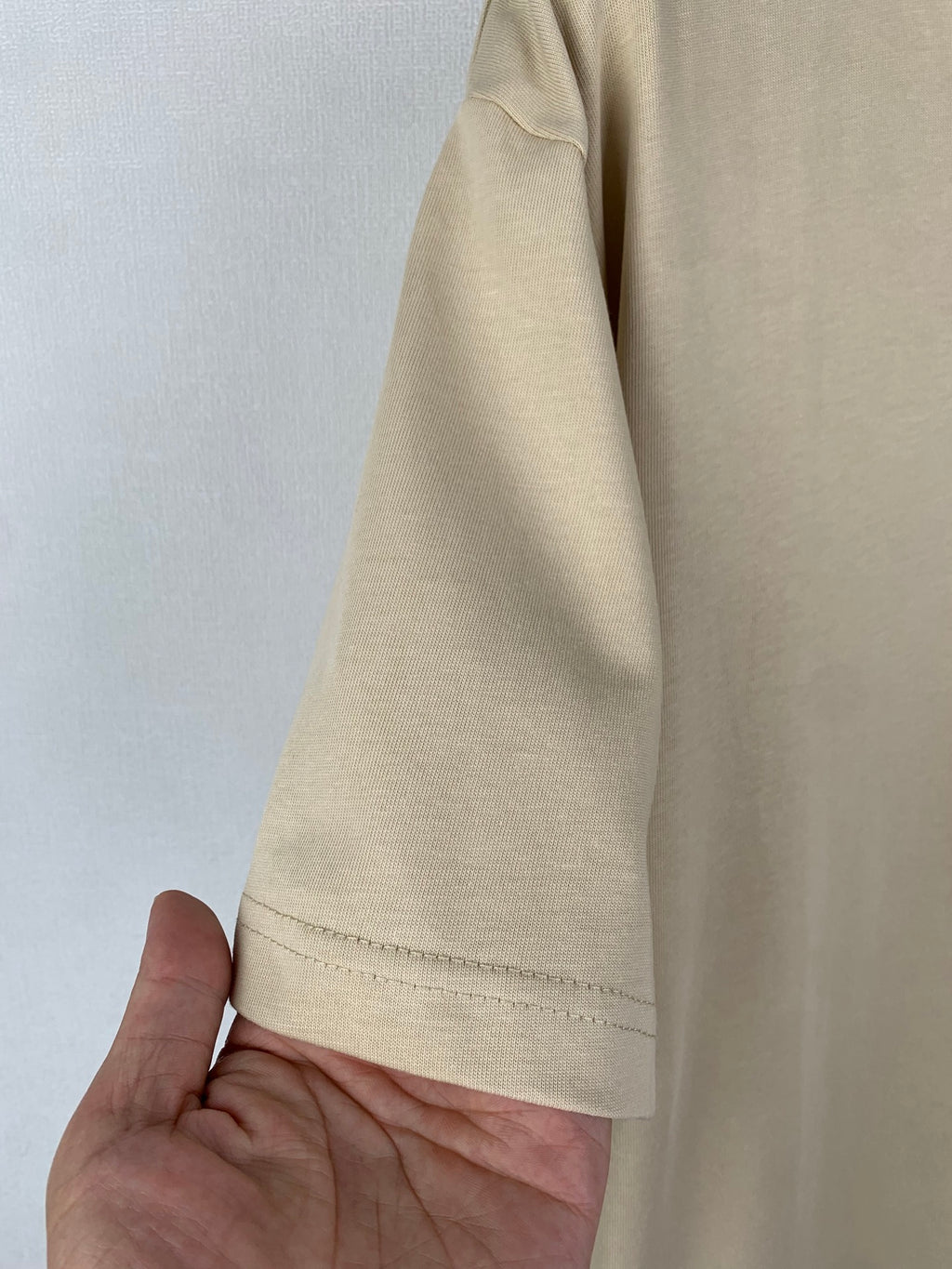 Beige T-shirt sleeve with side seam