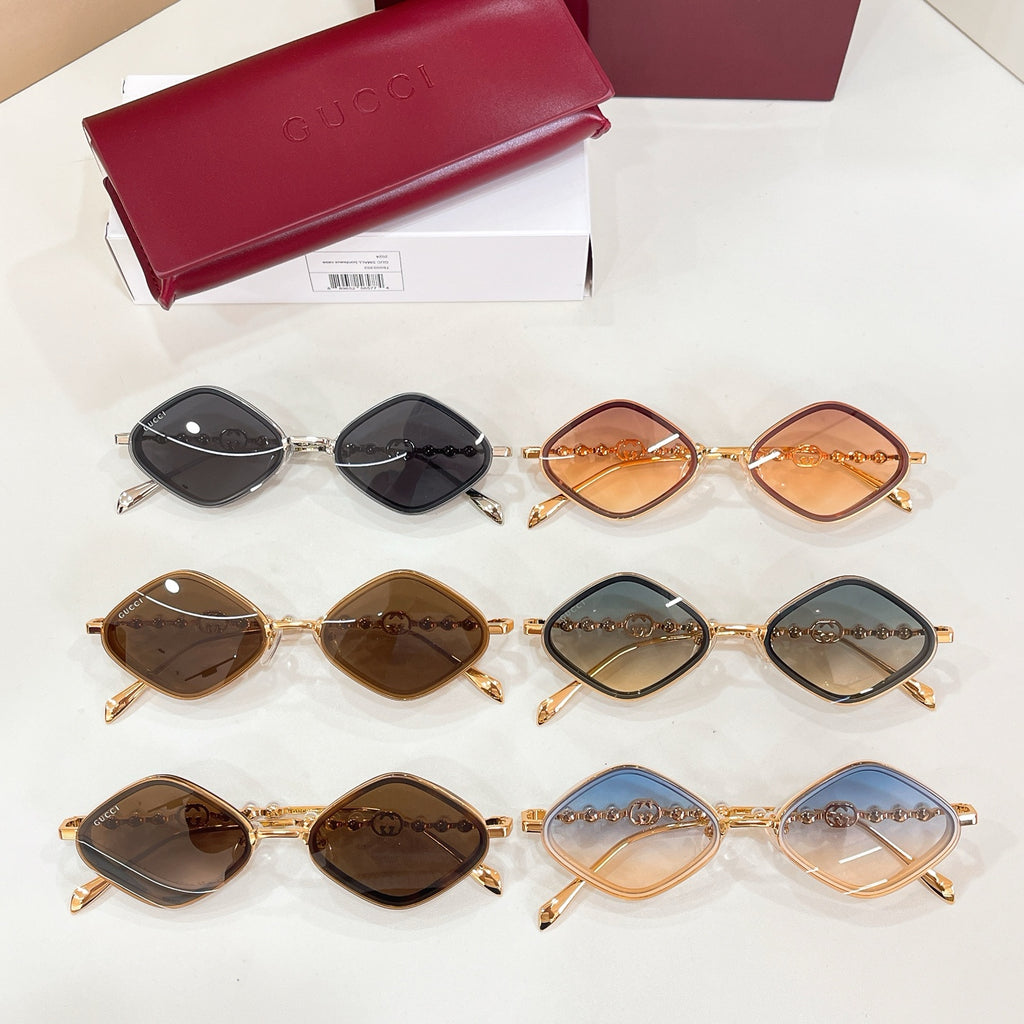 Assorted gold-framed round sunglasses set with mixed colored tinted lenses