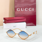 Gold round sunglasses with light blue lenses and pearl beaded temple accents
