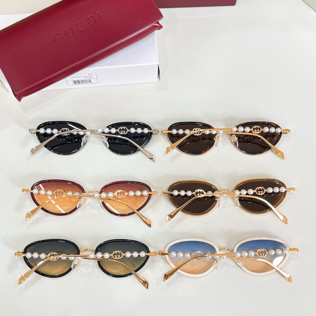 Gucci sunglasses assortment with pearl beaded frames and tinted oval lenses, multiple colors