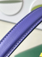 Close-up of purple leather strap with contrast stitching