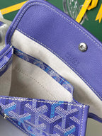 Open purple patterned bag with light interior lining and stitched edge trim