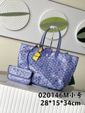 Blue patterned tote bag with top handles and two front zip pouches