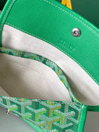 Open tote bag interior with green patterned pouch and stitched trim