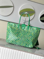 Green patterned tote bag with sturdy top handles and front pocket
