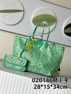 Green patterned tote bag with top handles and matching front pocket pouch