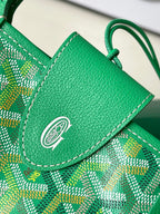 Green flap pocket with embossed logo on patterned tote bag