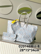 Light blue-and-white patterned designer tote bag with two top handles and small pouch