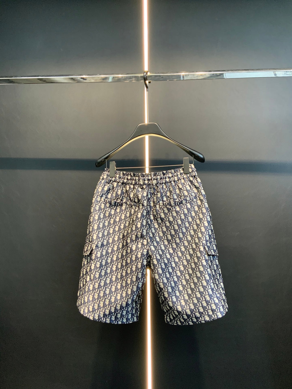 Dior monogram print shorts with elastic waistband, hanging straight on hanger