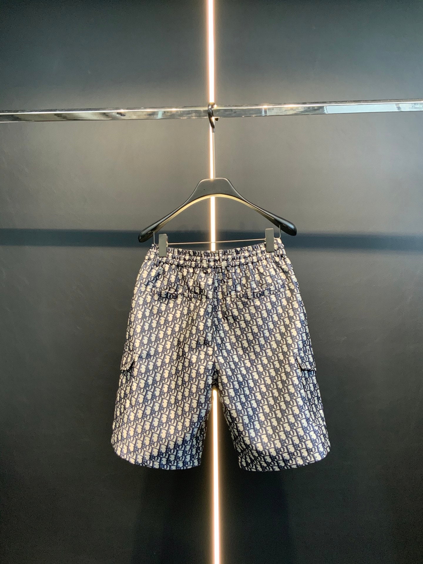 Dior monogram print shorts with elastic waistband, hanging straight on hanger