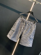 Dior monogram print shorts with elastic waistband, front view, blue and cream