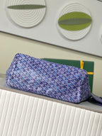 Blue patterned Goyard tote bag with zip top and structured base