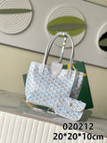 Goyard tote bag in light blue and white patterned canvas with gray leather handles