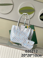Goyard tote bag in light blue and white patterned canvas with gray leather handles