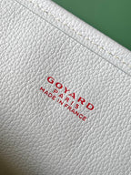 Light gray leather base with embossed Goyard Paris France logo text