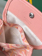Open pink interior pocket with fabric lining and drawstring close detail on tote.