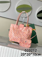 Pink patterned tote bag with top handles and attached small pouch, logo hardware.