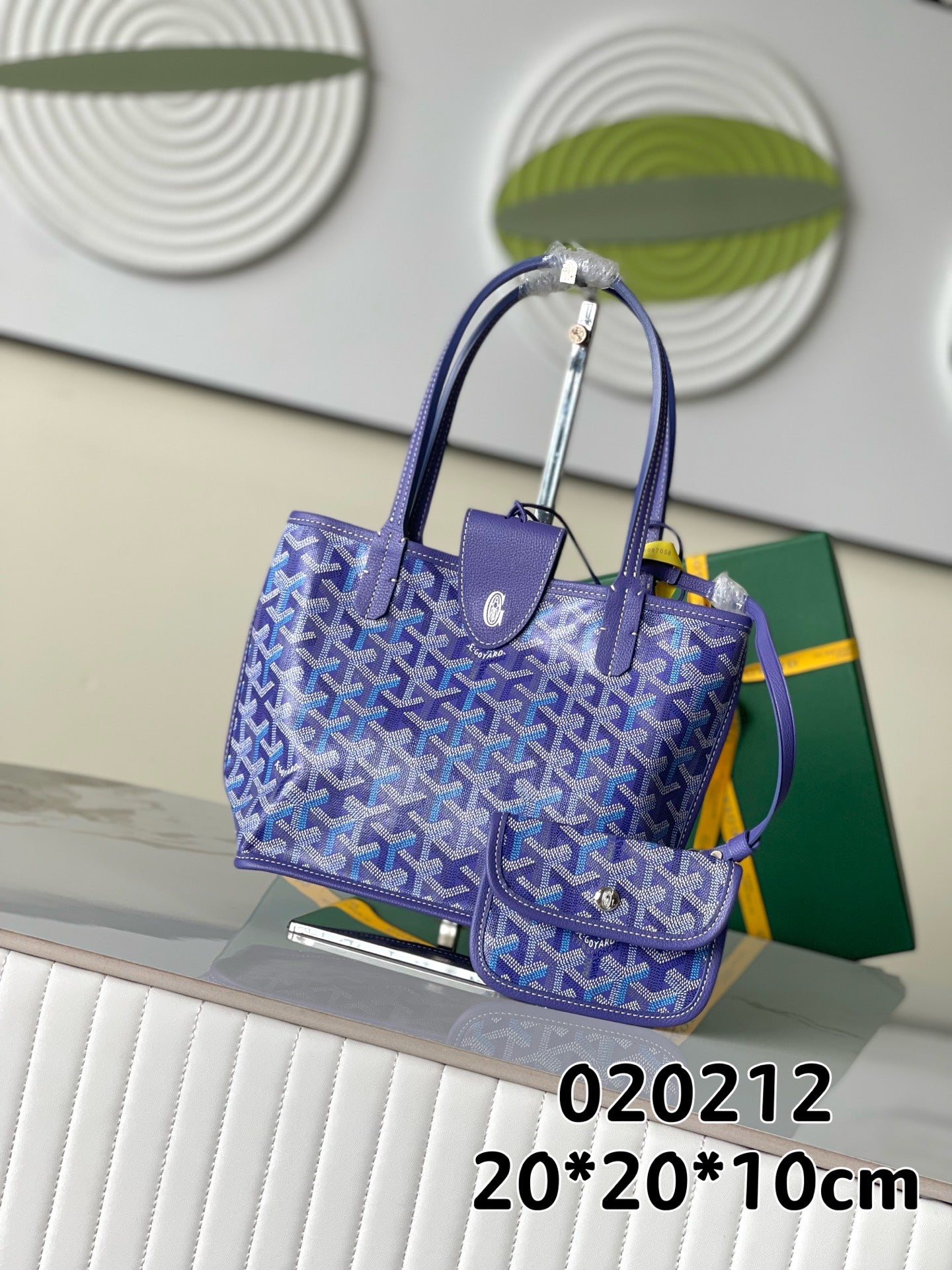 Goyard patterned tote bag in blue with leather handles and front pouch