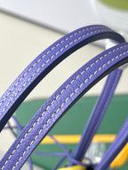 Blue leather tote handles with contrast piping and neat hand-stitching