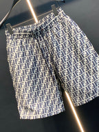 Dior logo-pattern shorts on hanger, front view with repeating logo print.