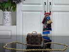 Monogram vanity bag with gold chain strap, top handle, brown canvas and multicolor scarf