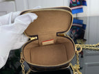 Monogram vanity bag open top pocket with gold zipper, brown fabric lining