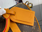 Louis Vuitton monogram bag with orange flap pocket and gold-tone hardware