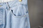 Light blue denim pants front pocket and buttoned waistband details