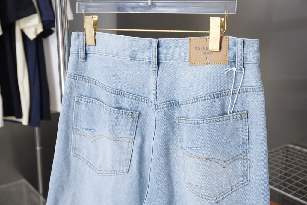 Light blue denim pants with front patch pockets and belt loops