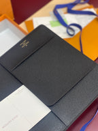 Louis Vuitton textured wallet, dark blue, with front flap and card pocket