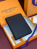 Louis Vuitton leather wallet in dark finish, slim rectangular profile