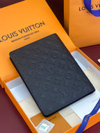Dark embossed monogram leather small bag with front flap